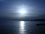 Cirrostratus (Cs) felh�n �ts�t a lemen� nap
